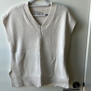 White sleeveless sweater